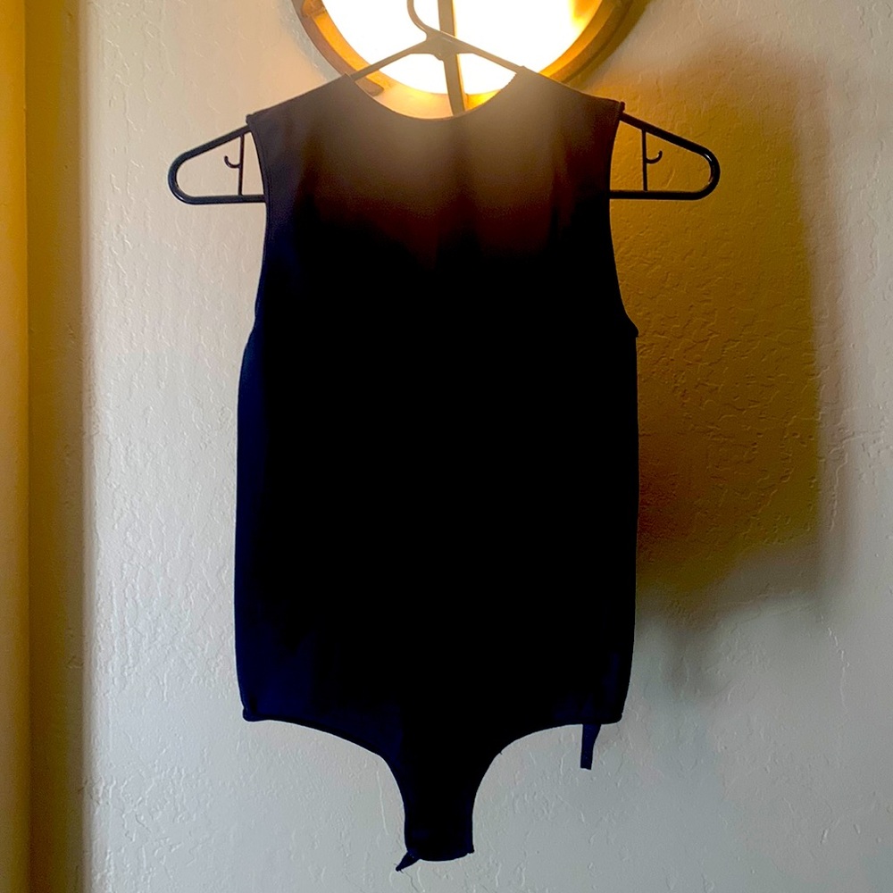 Skims black tank bodysuit. Size s/m